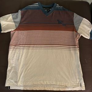 Mint condition rocawear shirt. Color cream, brown and blue.